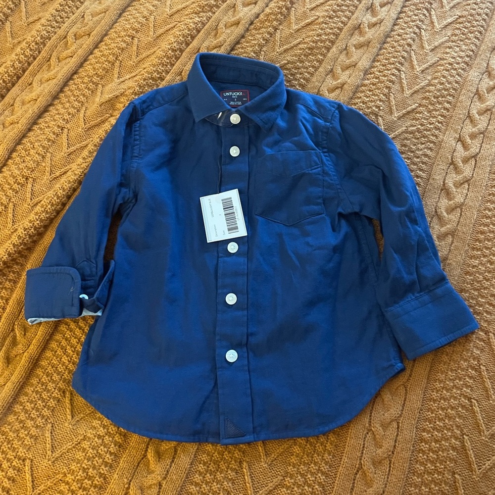 Toddler boys untuck it top